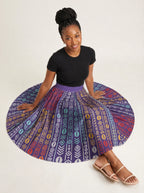 "Oshun Zamani" Twirl Skirt — seated on the floor with the skirt fanned out