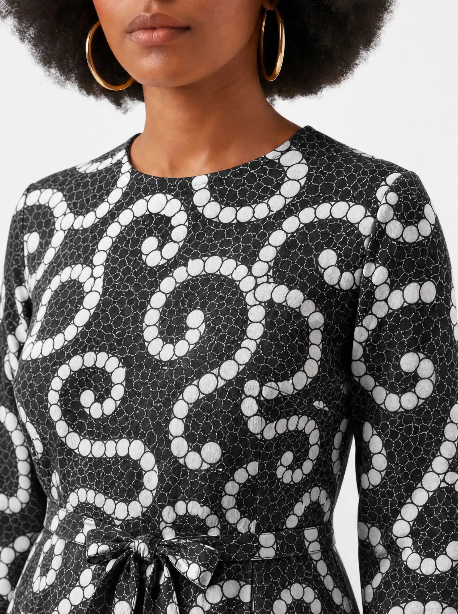 "Duara" Viscose Midi Dress — close-up of the round neckline and long sleeve