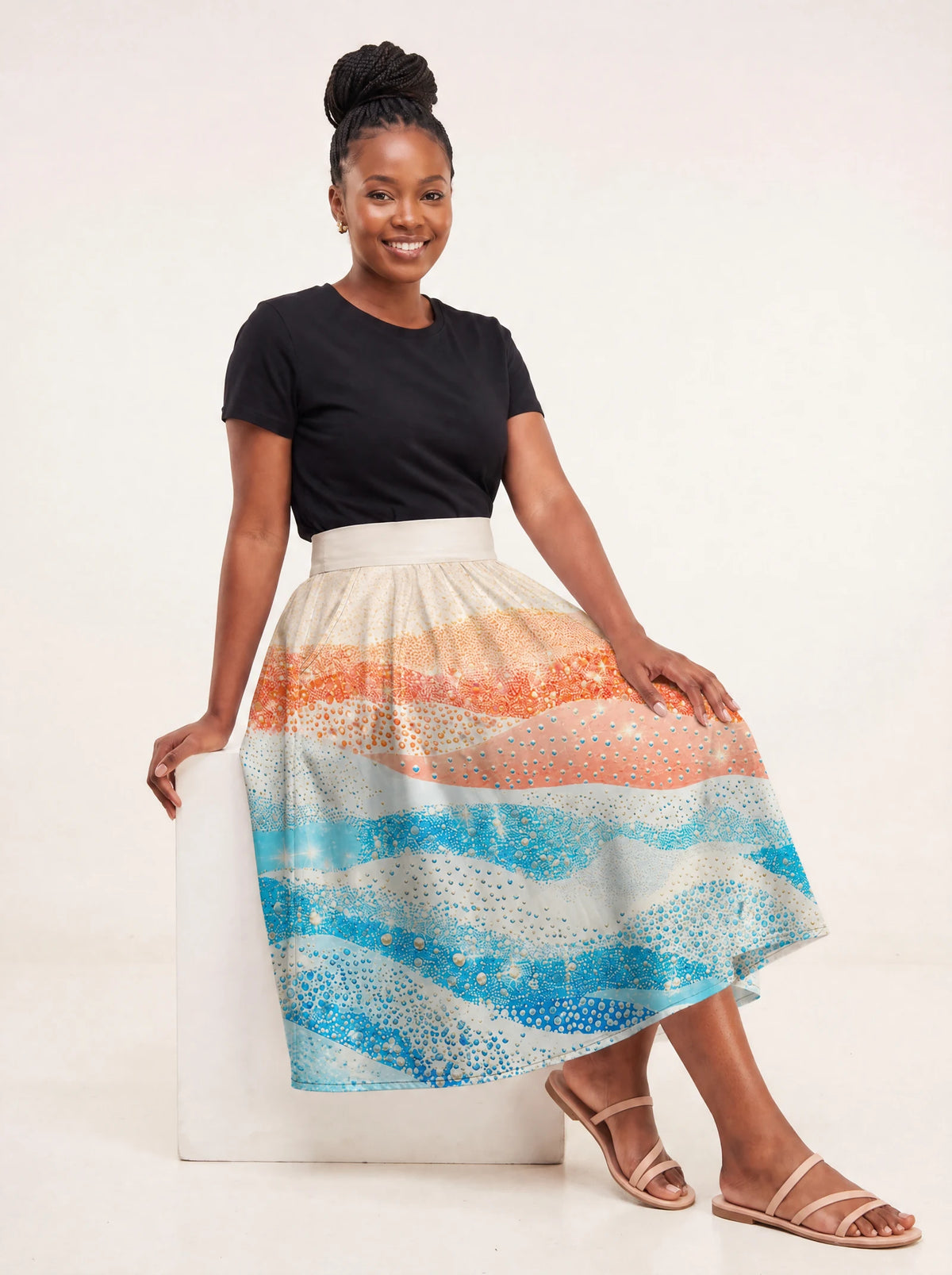 "Maji" Twirl Skirt — seated on model