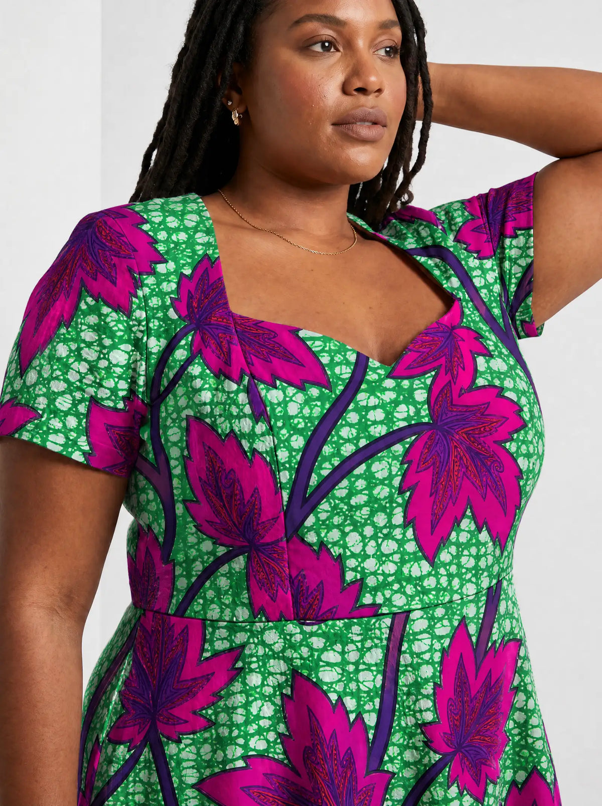 "Mzabibu" Sweetheart Midi Dress — close-up of the sweetheart neckline and short sleeve