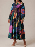 "Bustani" Long Puff Sleeve Dress — three-quarter view on model