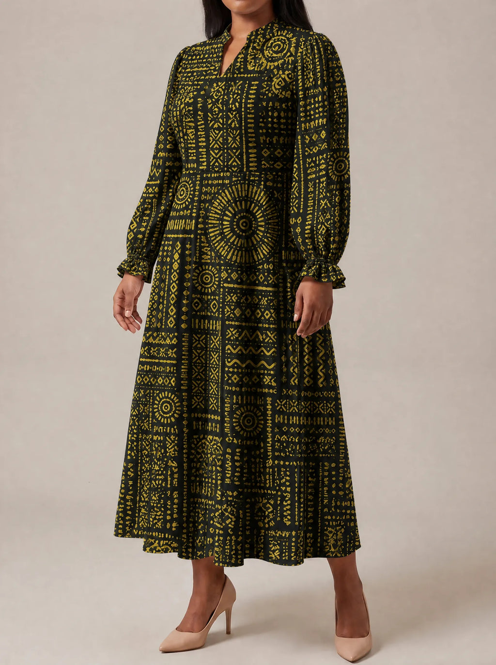 "Lamu" Long Puff Sleeve Dress — three-quarter view on model