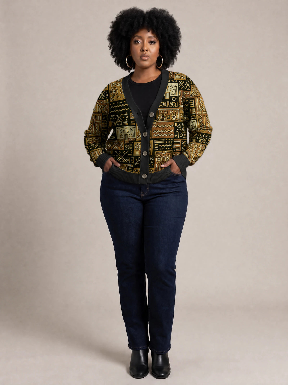 "Sankofa" Knitted Cardigan — on model with hands in her jeans pockets