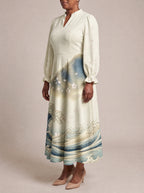 "Wimbi" Long Puff Sleeve Dress — three-quarter view on model