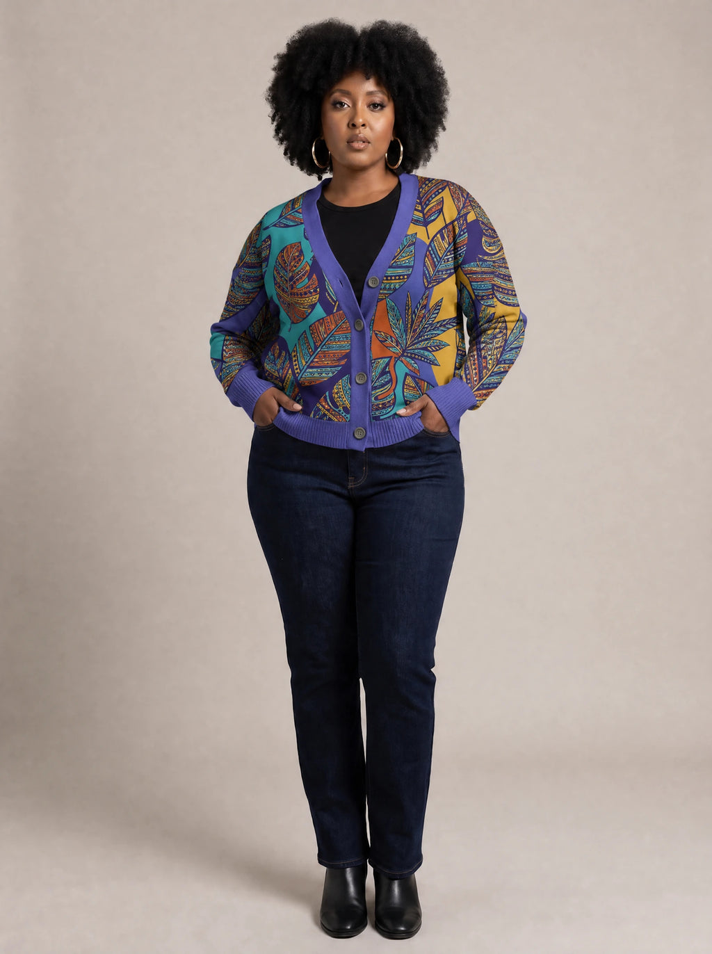 "Majani" Cardigan — on model with hands in her jeans pockets