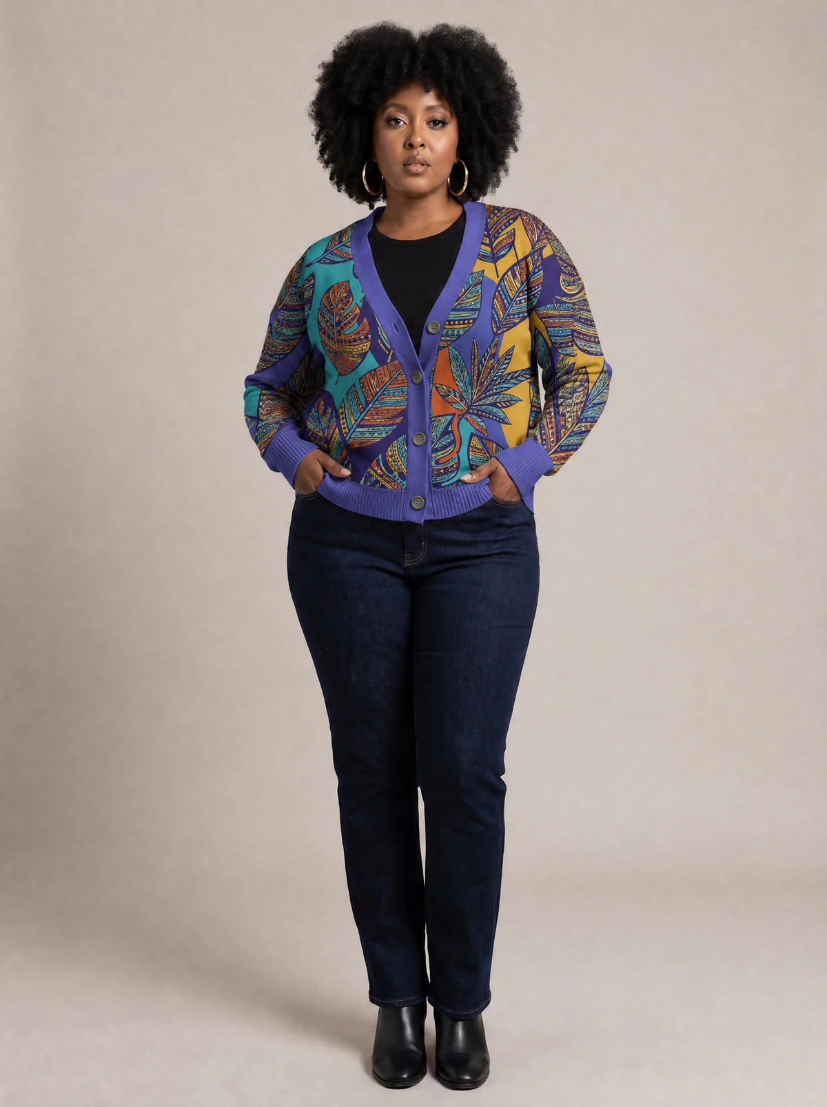 "Majani" Cardigan — on model with hands in her jeans pockets