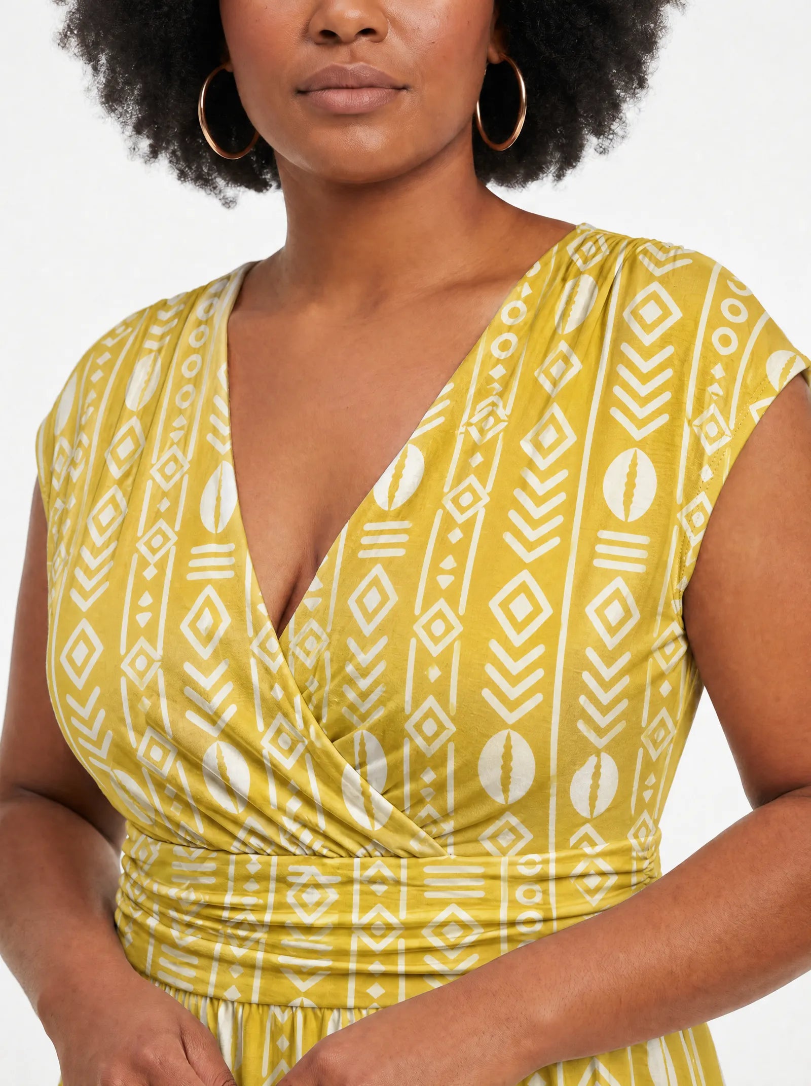 "Oshun Dhahabu" Cap Sleeve Midi Dress — close-up of the V-neckline and cap sleeve