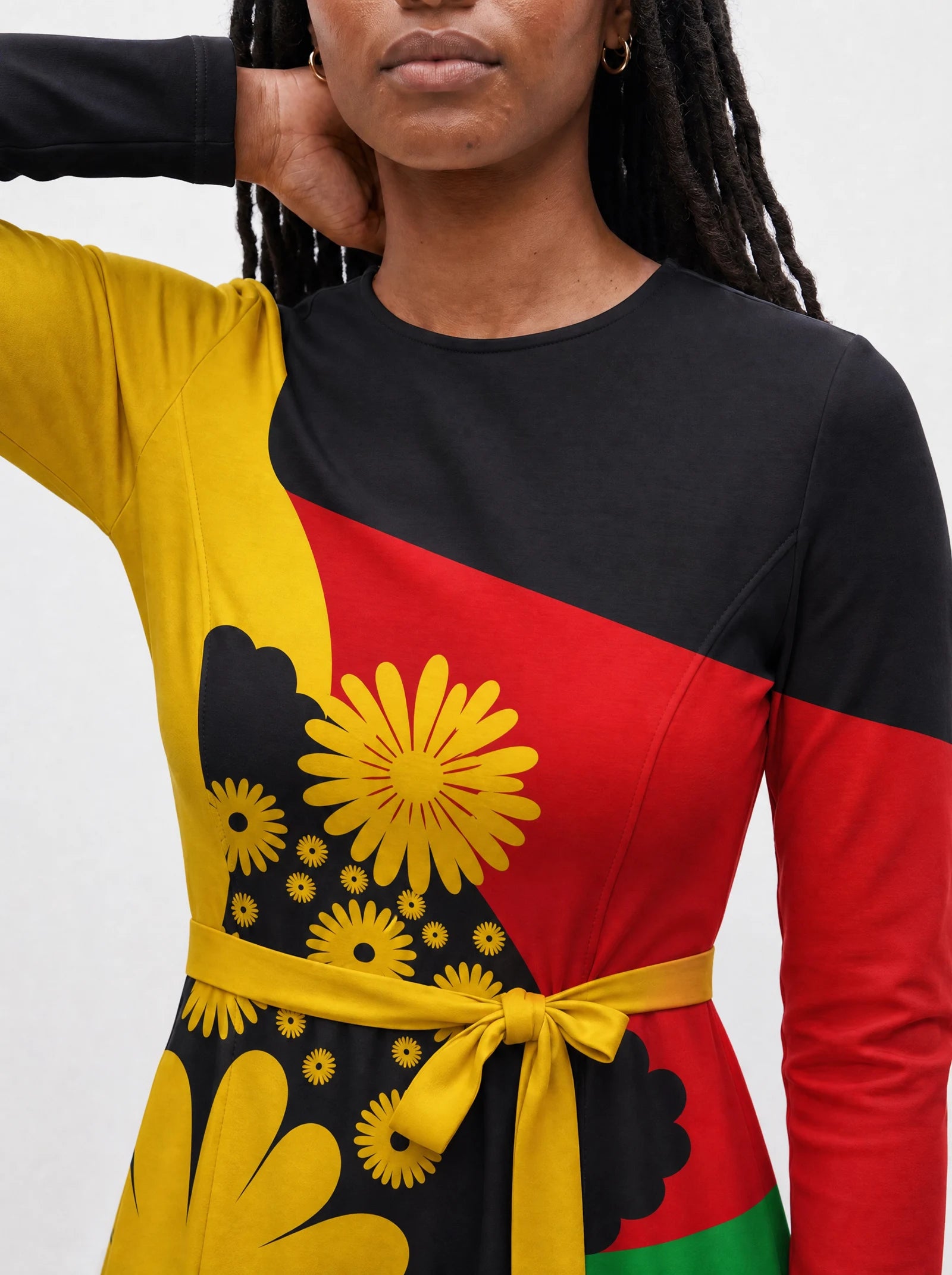 "Furaha" Viscose Midi Dress — close-up of the round neckline and long sleeve