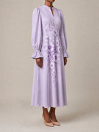 "Zambarau" Long Puff Sleeve Dress — three-quarter view on model