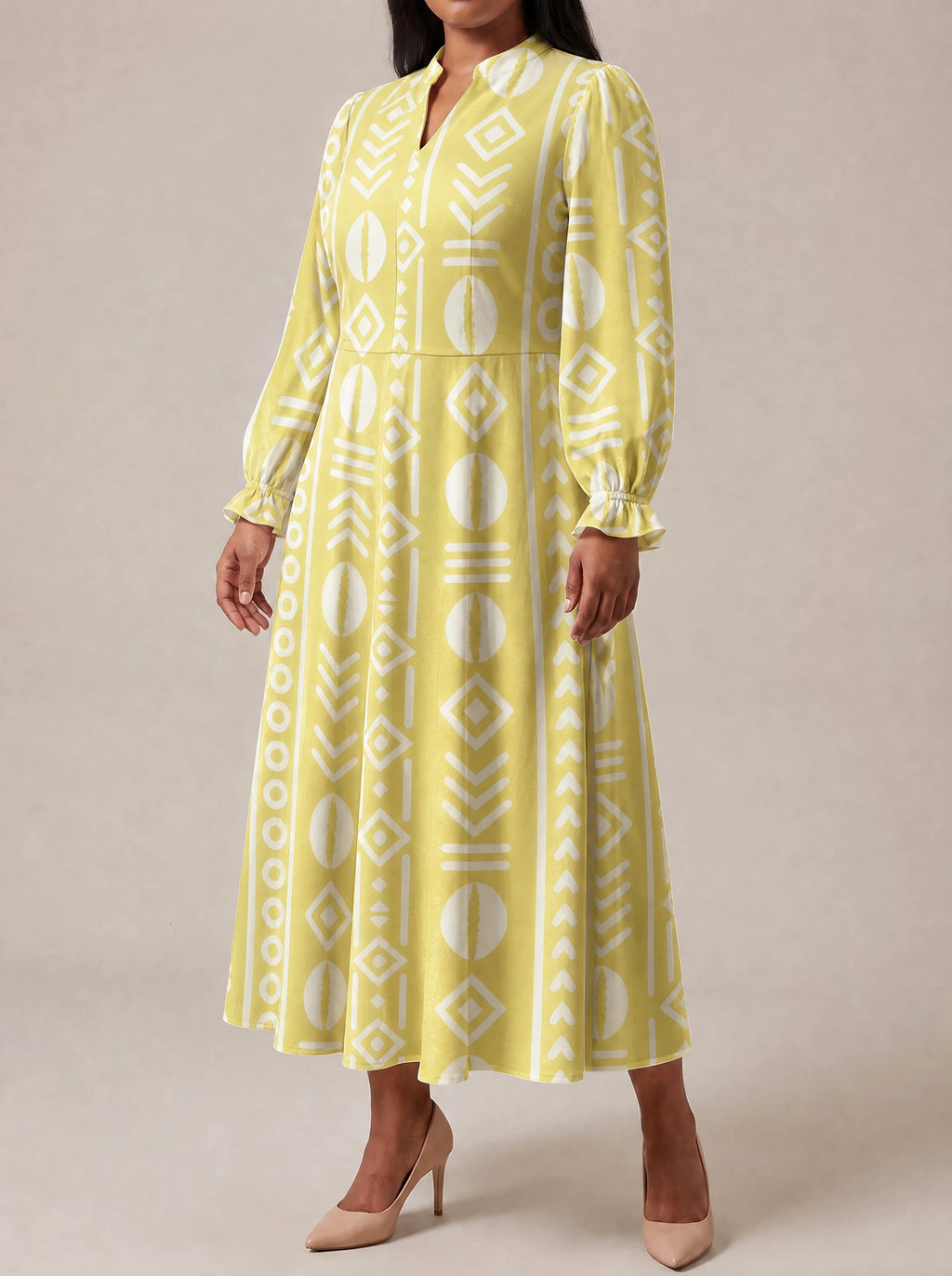 "Oshun Dhahabu" Long Puff Sleeve Dress — three-quarter view on model