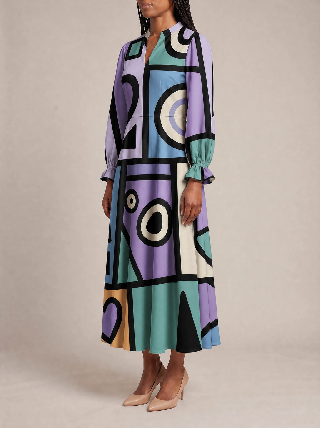 "Sanaa" Long Puff Sleeve Dress — three-quarter view on model