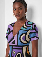 "Sanaa" Short Sleeve Maxi Dress — three-quarter view on model