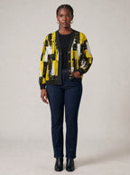 "Mvua" Cardigan — on model with hands in her jeans pockets