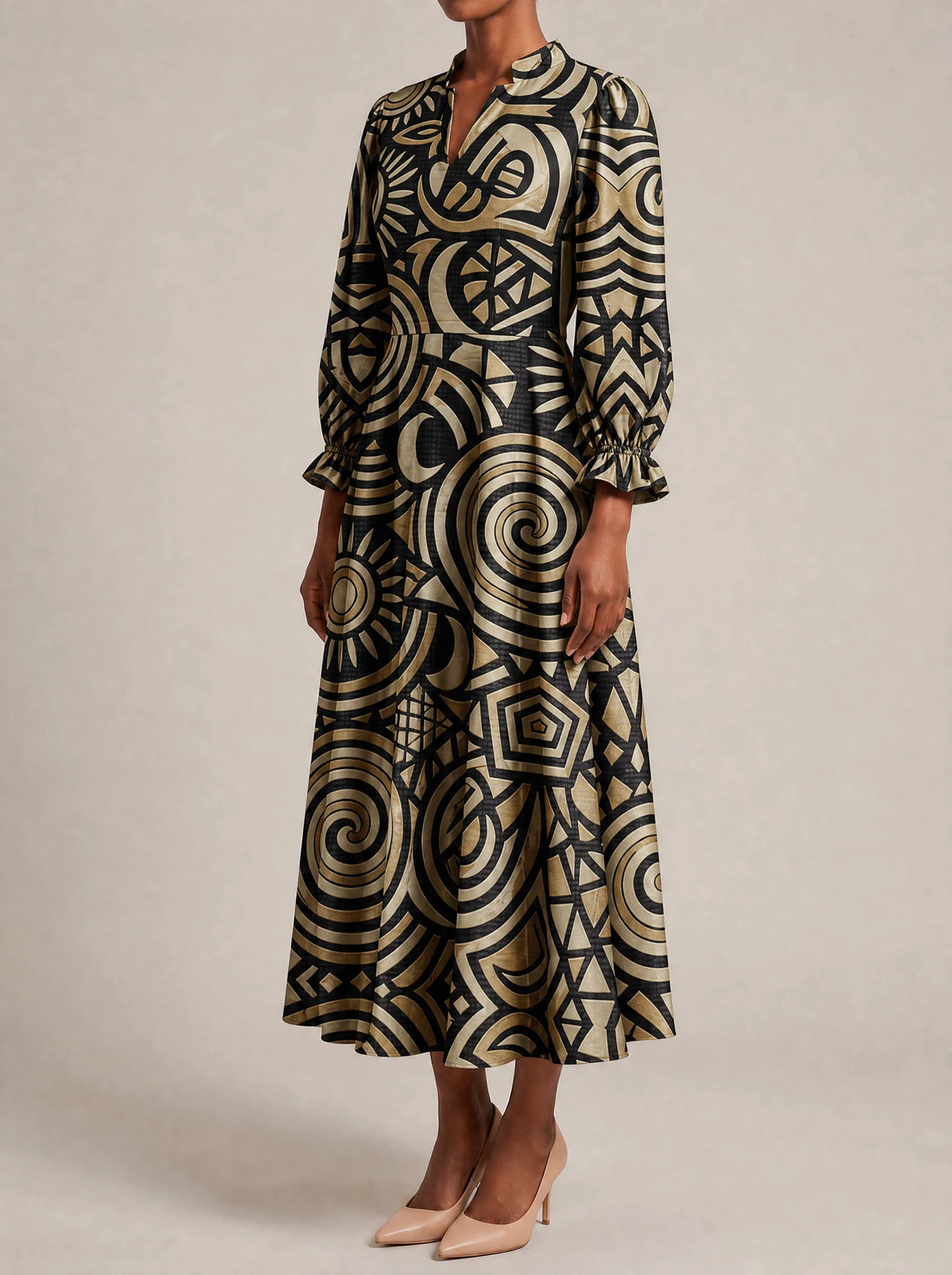 "Sahara" Long Puff Sleeve Dress — three-quarter view on model