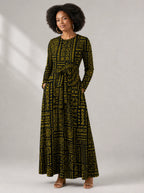 "Lamu" Viscose Midi Dress — close-up of the round neckline and long sleeve