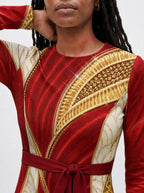 "Utukufu" Long Sleeve Midaxi Dress — three-quarter view on model