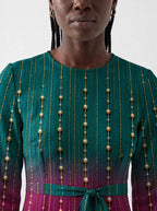 "Lulu" Long Sleeve Midaxi Dress — three-quarter view on model