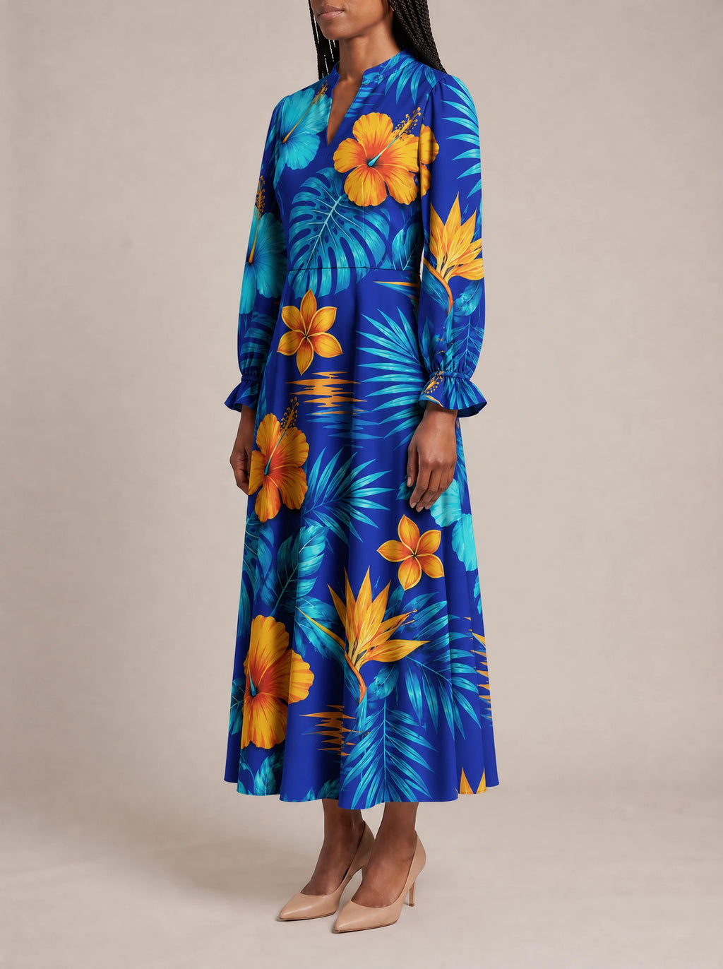 "Maua" Long Puff Sleeve Dress — three-quarter view on model