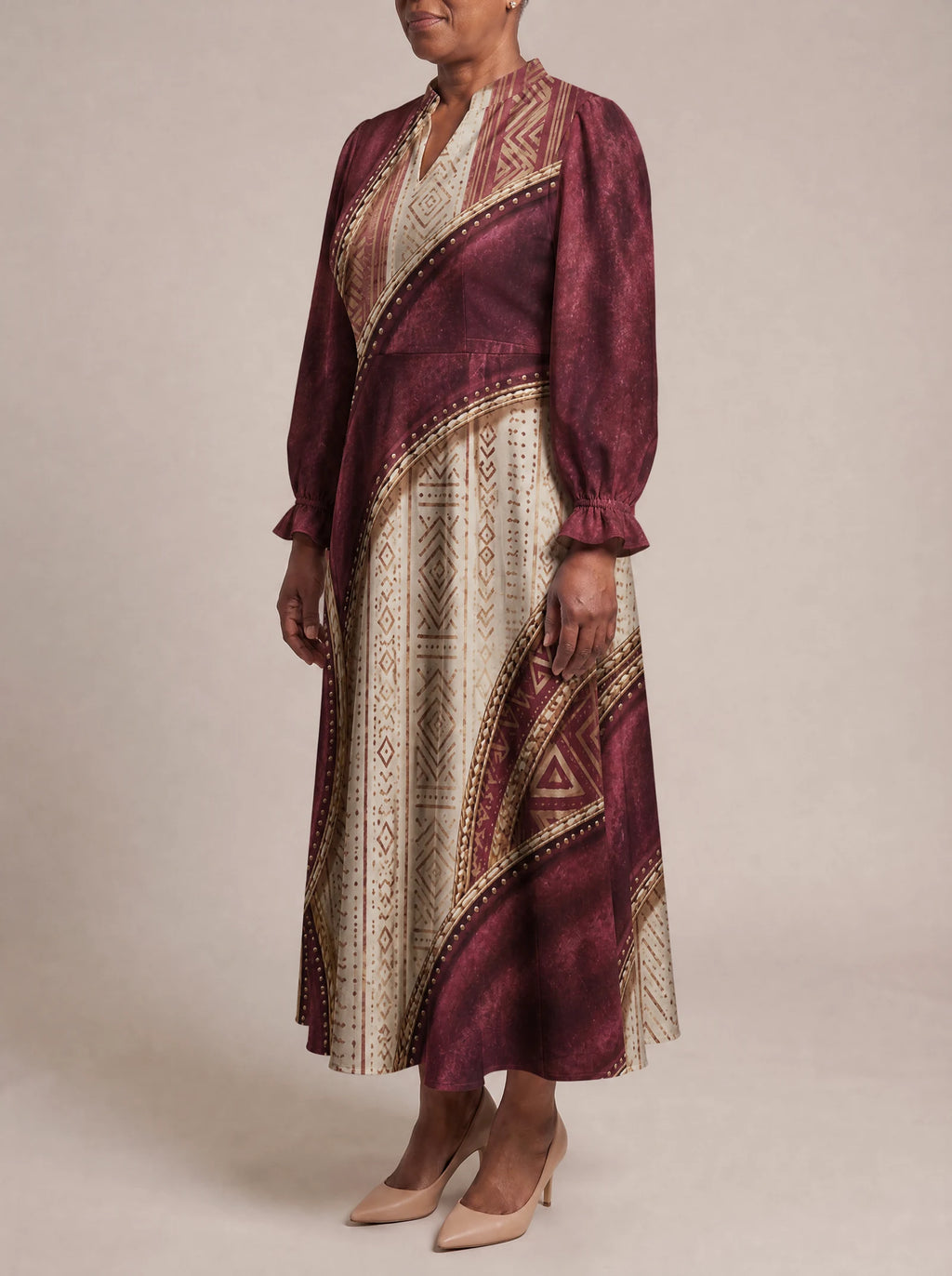 "Tapa" Long Puff Sleeve Dress — three-quarter view on model