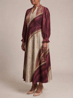 "Tapa" Long Puff Sleeve Dress — three-quarter view on model
