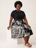 "Usiku" Twirl Skirt — seated on model