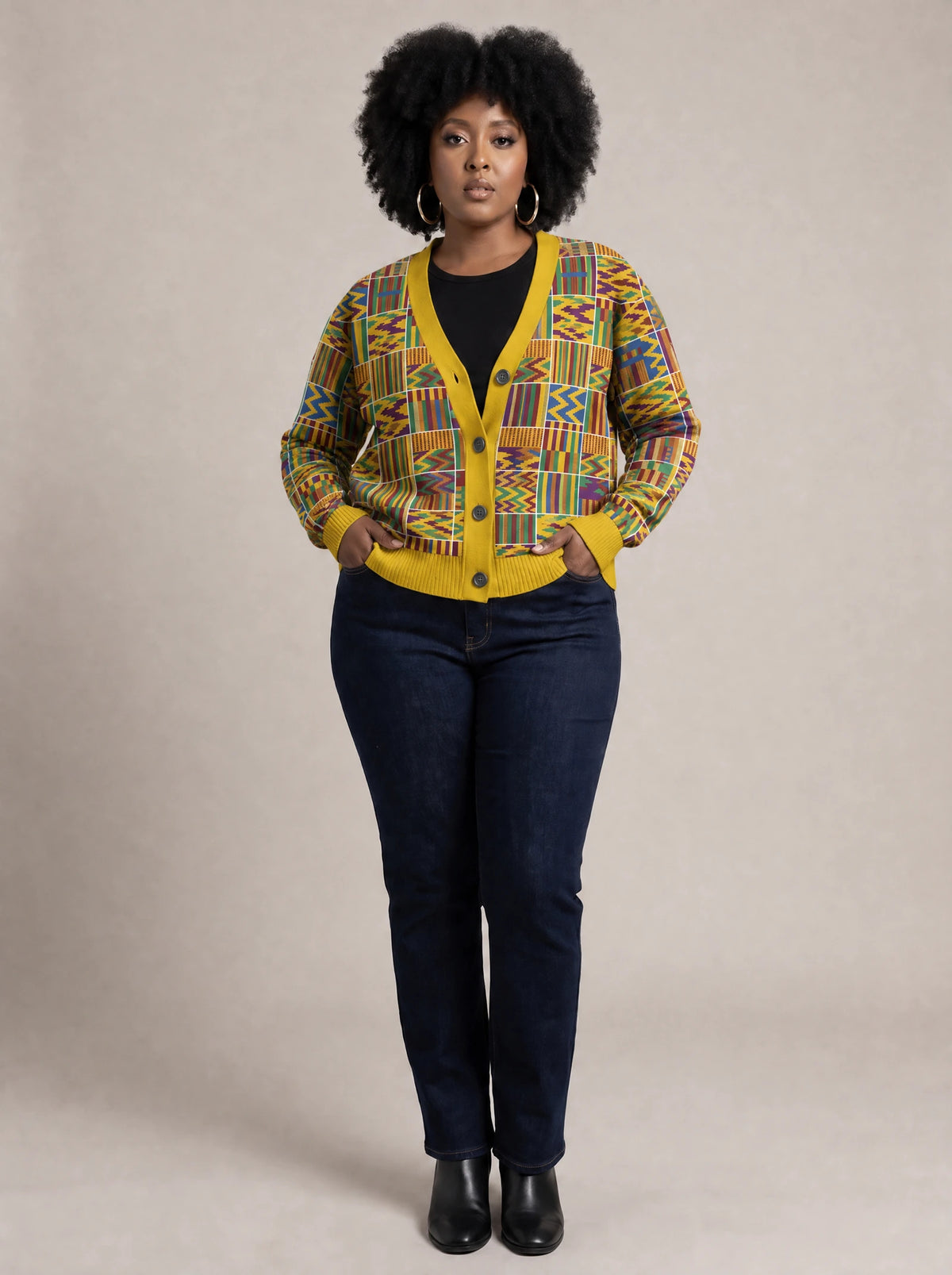 "Shangwe" Cardigan — on model with hands in her jeans pockets