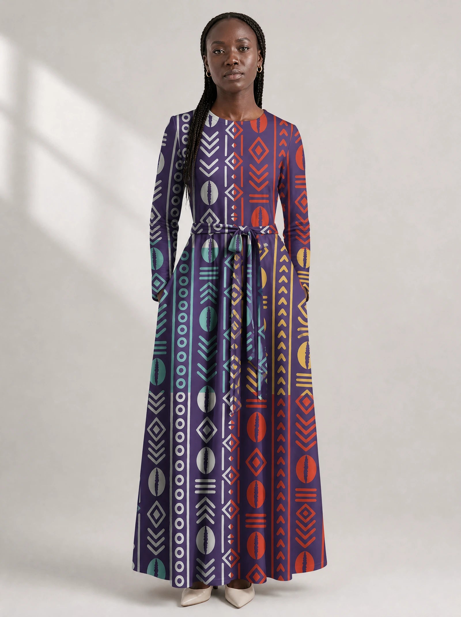 "Oshun Zamani" Viscose Midi Dress — close-up of the round neckline and long sleeve
