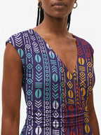 "Oshun Zamani" Cap Sleeve Midi Dress — close-up of the V-neckline and cap sleeve