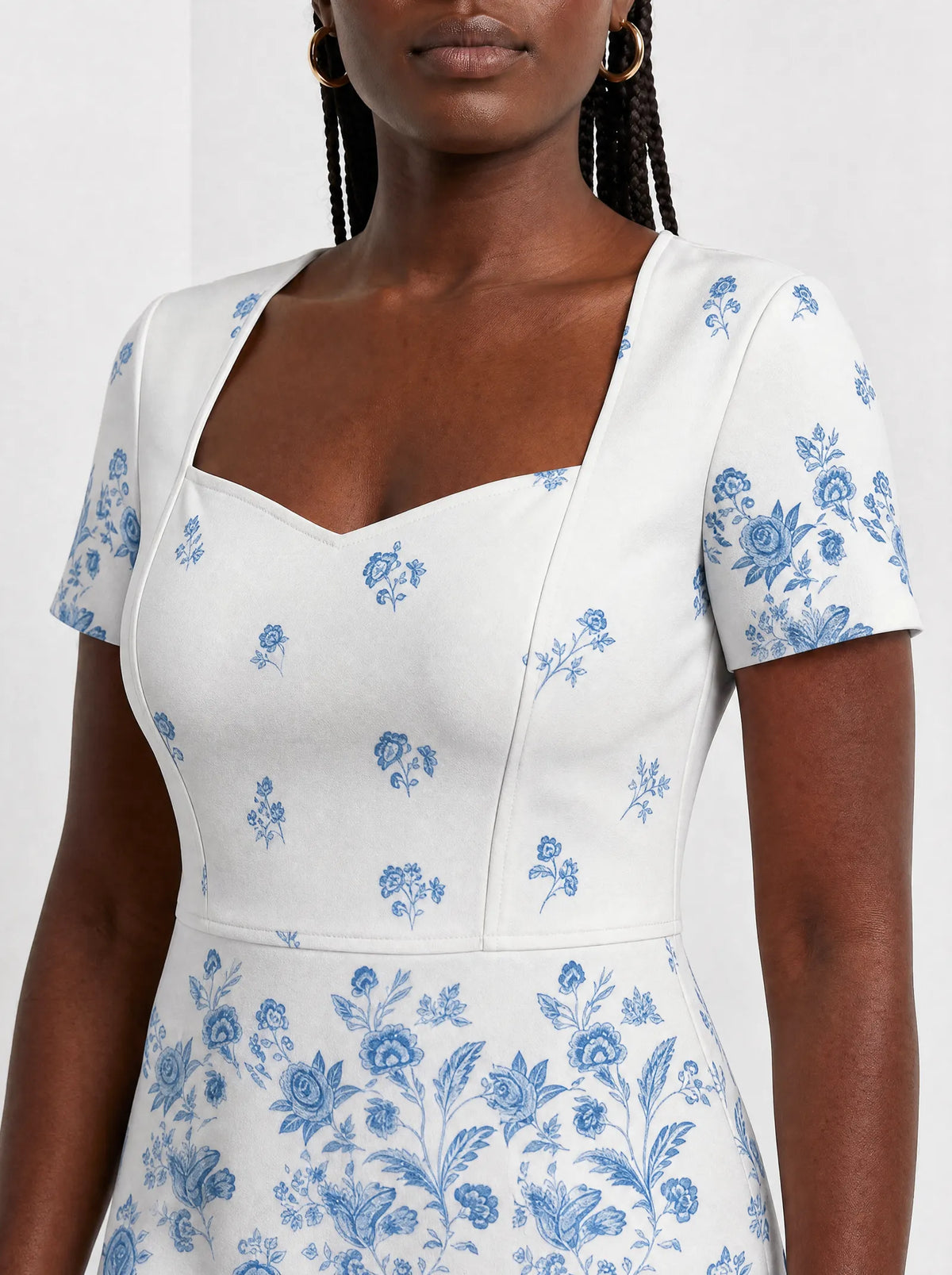 "Buluu" Sweetheart Midi Dress — close-up of the sweetheart neckline and short sleeve