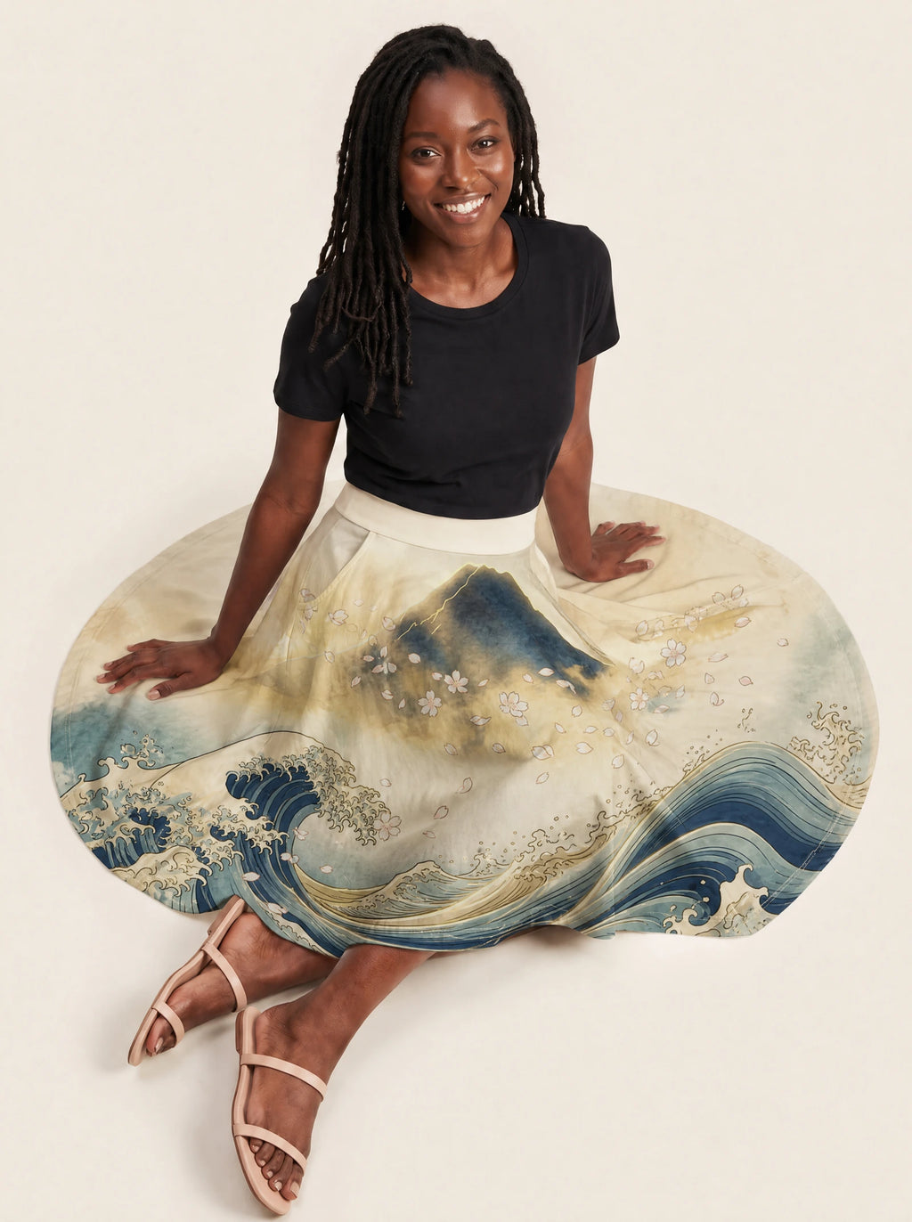 "Wimbi" Twirl Skirt — seated on the floor with the skirt fanned out