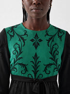 "Green Witch" Long Sleeve Midaxi Dress — three-quarter view on model