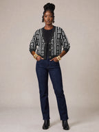 "Kuba" Cardigan — on model with hands in her jeans pockets