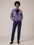 "Johari" Cardigan — on model with hands in her jeans pockets