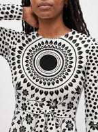 "Mwanga" Viscose Midi Dress — close-up of the round neckline and long sleeve