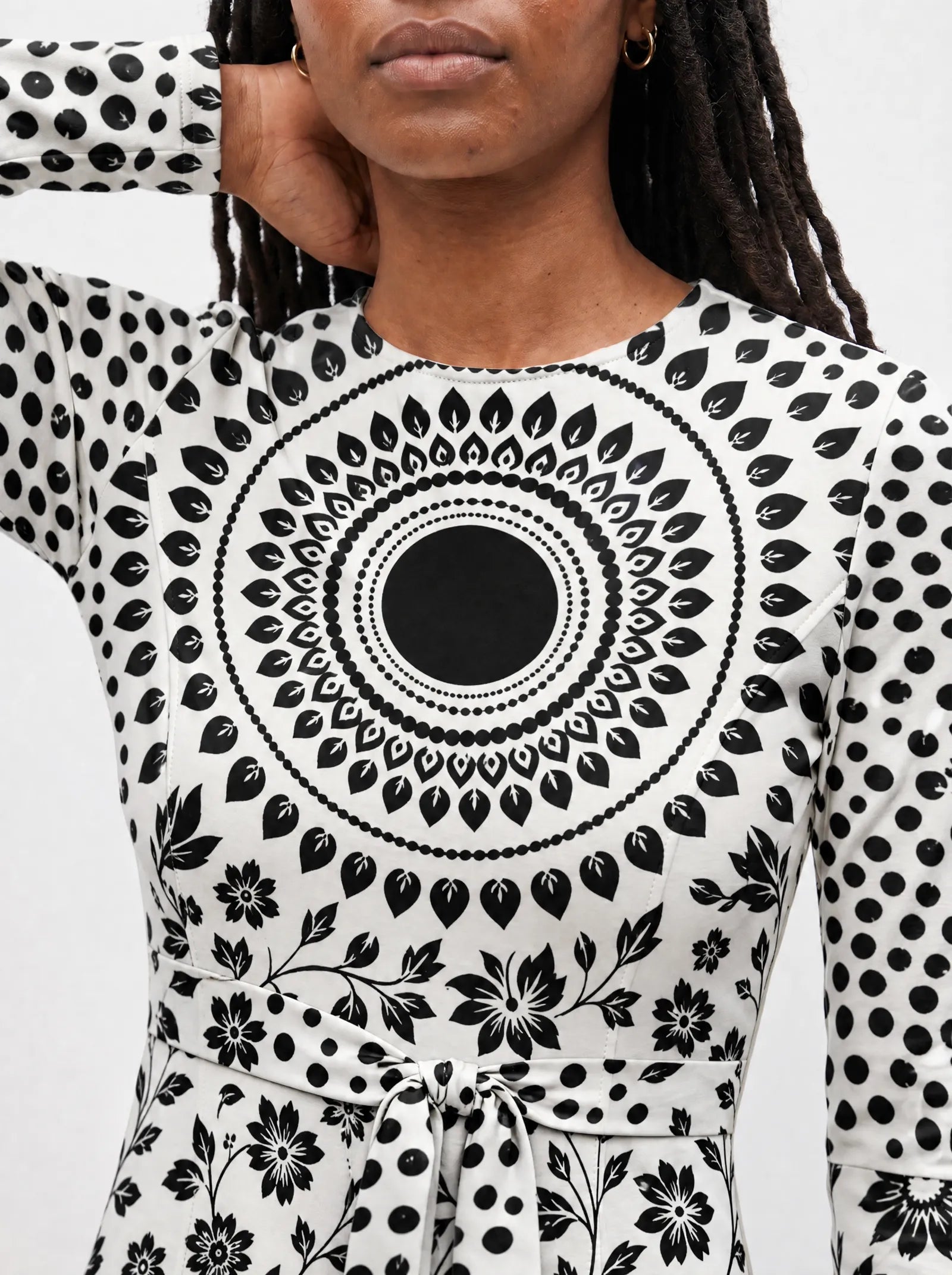 "Mwanga" Viscose Midi Dress — close-up of the round neckline and long sleeve