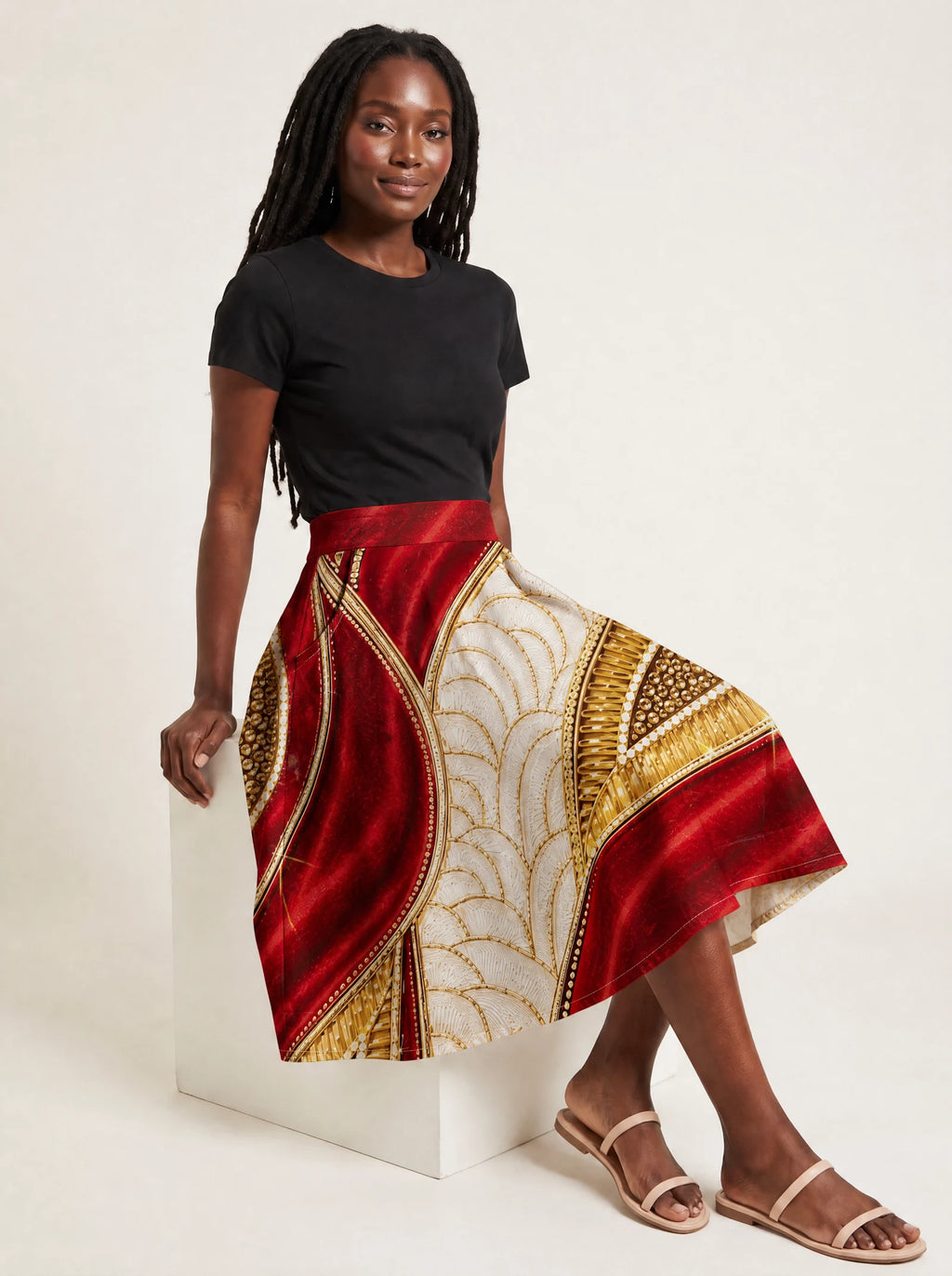 "Utukufu" Twirl Skirt — seated on model