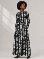 "Kuba" Viscose Midi Dress — close-up of the round neckline and long sleeve