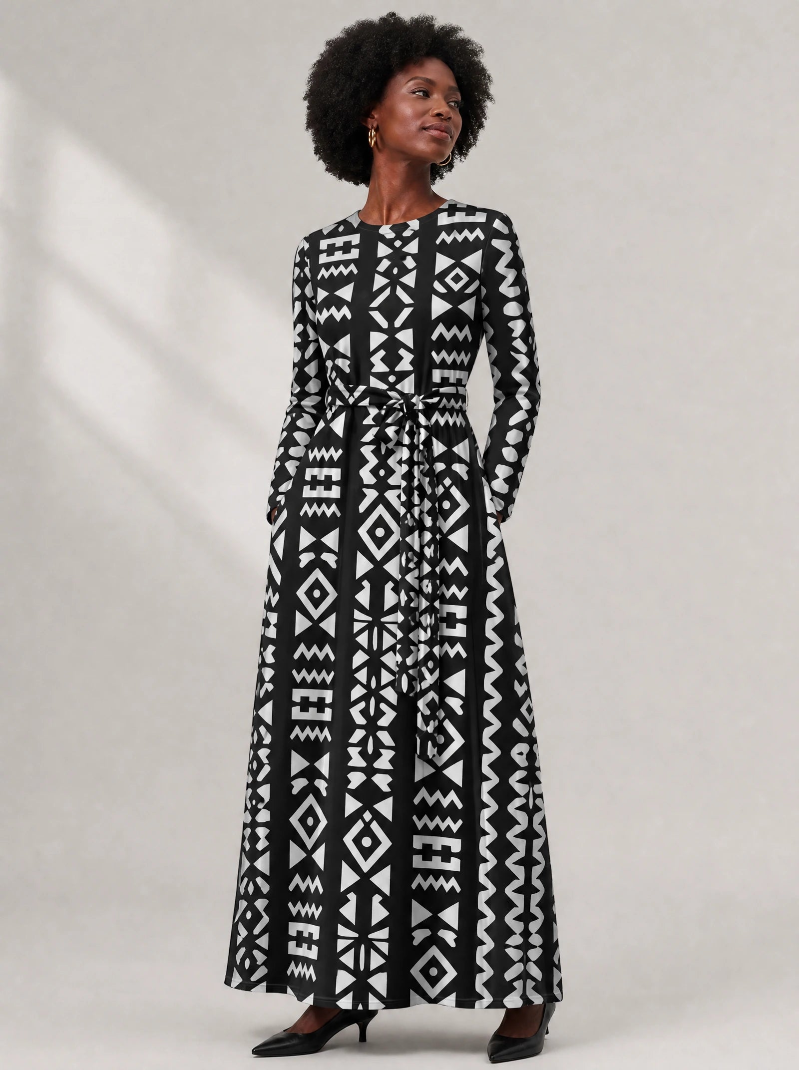"Kuba" Viscose Midi Dress — close-up of the round neckline and long sleeve
