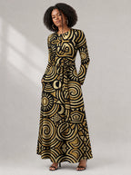 "Sahara" Viscose Midi Dress — close-up of the round neckline and long sleeve
