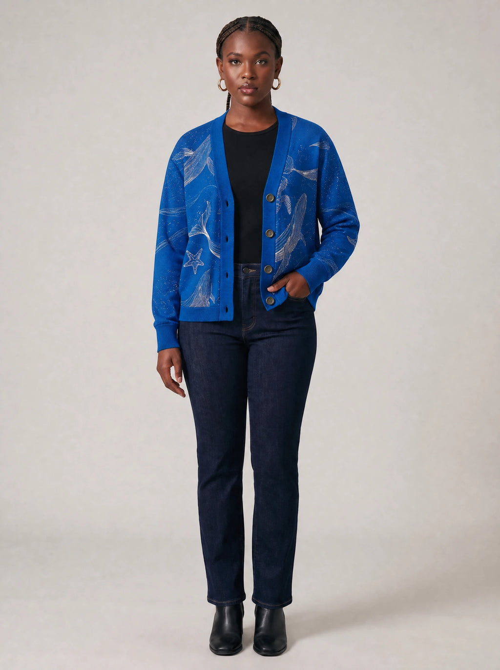 "Pwani" Cardigan — on model with hands in her jeans pockets