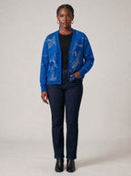 "Pwani" Cardigan — on model with hands in her jeans pockets