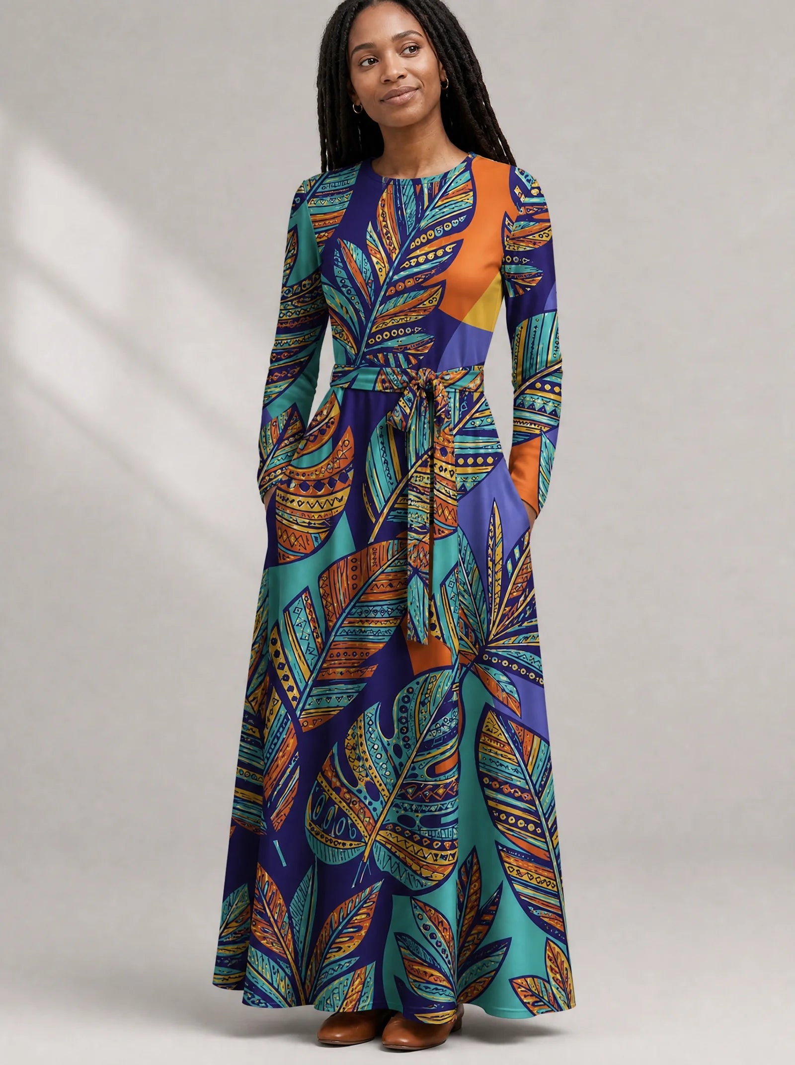 "Majani" Viscose Midi Dress — close-up of the round neckline and long sleeve