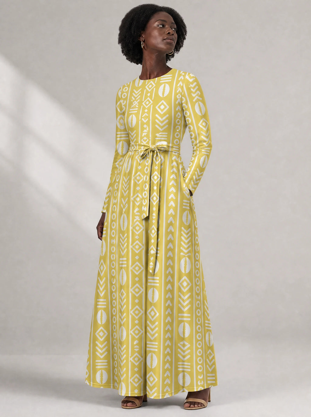 "Oshun Dhahabu" Viscose Midi Dress — close-up of the round neckline and long sleeve