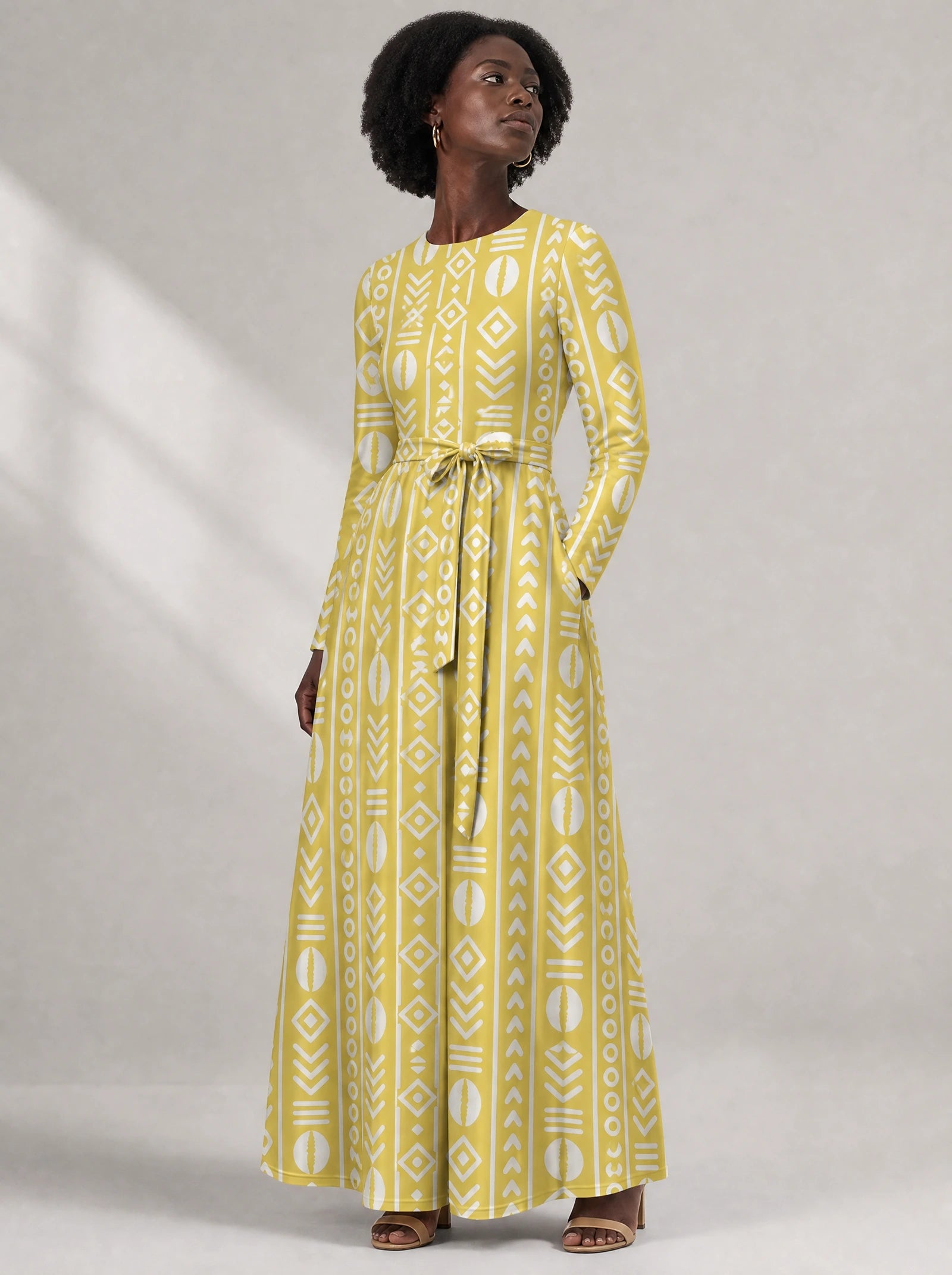 "Oshun Dhahabu" Viscose Midi Dress — close-up of the round neckline and long sleeve