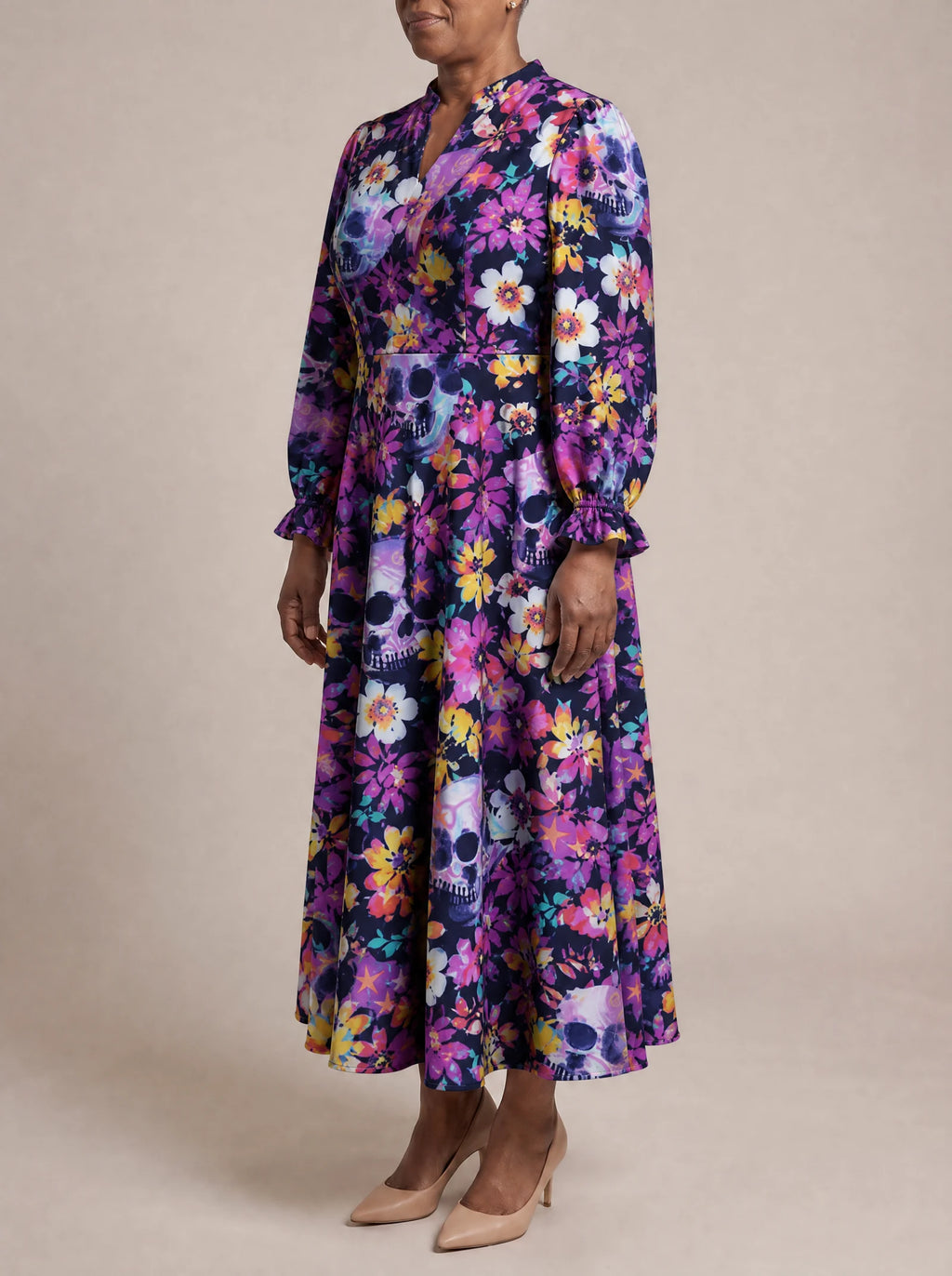 "Njozi" Long Puff Sleeve Dress — three-quarter view on model