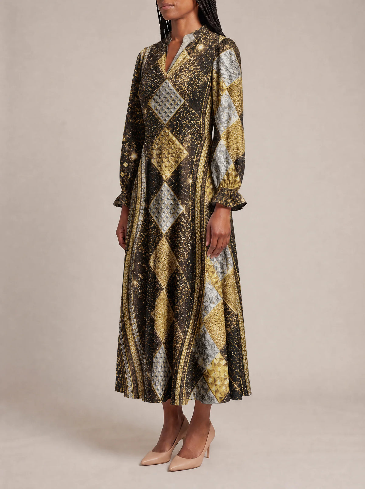 "Fataki" Long Puff Sleeve Dress — three-quarter view on model