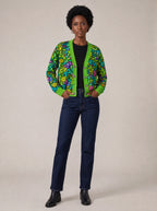 "Zumaridi" Cardigan — on model with hands in her jeans pockets