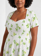 "Yasmini" Sweetheart Midi Dress — close-up of the sweetheart neckline and short sleeve