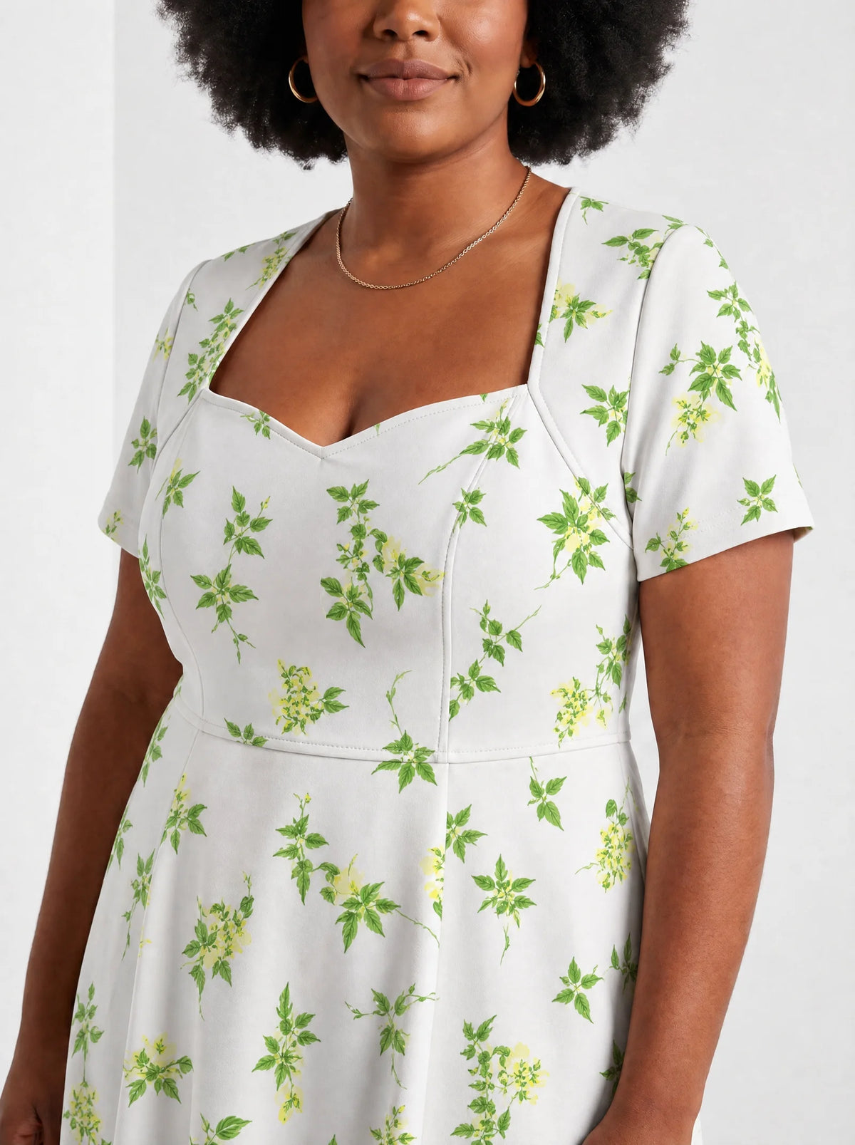 "Yasmini" Sweetheart Midi Dress — close-up of the sweetheart neckline and short sleeve