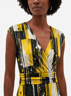 "Mvua" Cap Sleeve Midi Dress — close-up of the V-neckline and cap sleeve